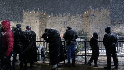 But people were outside enjoying the snow. AP