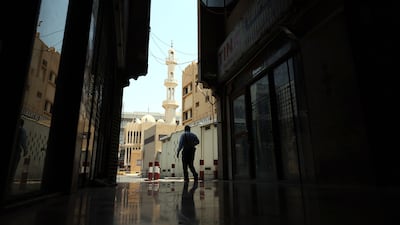 People shop on a hot day in Bur Dubai, Dubai. Chris Whiteoak / The National