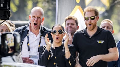 The couple cheer the participants. AFP
