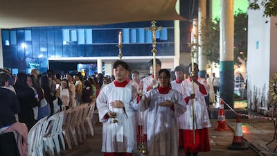 Worshippers during Christmas Eve Mass at St Joseph Church in Abu Dhabi