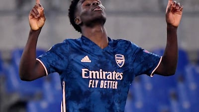 Arsenal's Bukayo Saka celebrates scoring his side's leveller in a frustrating night for the Gunners. Reuters