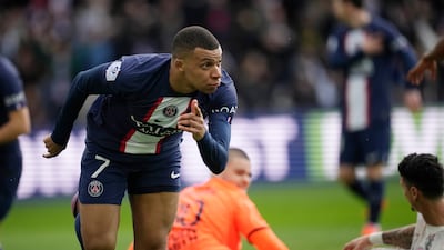Mbappe celebrates after scoring. AP