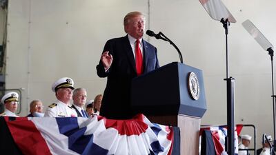President Donald Trump has returned from a commissioning ceremony for a new aircraft carrier in combative mood (AP Photo/Carolyn Kaster)