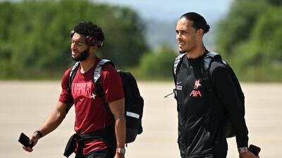 Joe Gomez and Virgil van Dijk at the John Lennon Airport before their departure to Paris on Friday. AFP