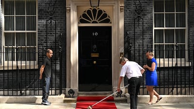 The red carpet is prepared ahead of Mr Biden's arrival. Getty Images
