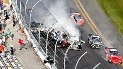 NASCAR driver Kyle Larson (32) and his Chevrolet end up in the fence during the final lap crash during the during the Nascar Nationwide Series. Pierre Ducharme / Reuters