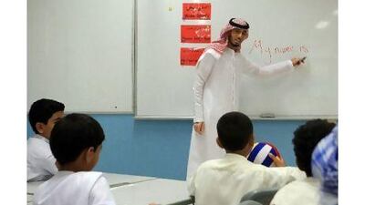 A reader comments that Ahmed Al Maamari is a role model for other male teachers. Ravindranath K / The National