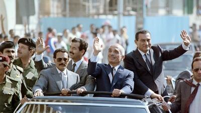 From left to right: Then North Yemeni President Ali Abdullah Saleh, Iraqi President Saddam Hussein, Jordanian King Hussein and Egyptian President Hosni Mubarak, wave to the crowd, on June 15, 1989 during a motorcade rally prior to the opening of the Arab Cooperation Council in Alexandria, Egypt. AFP