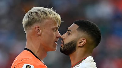 Dutch defender Jan Paul Van Hecke, left, squares up to Morocco midfielder Ismael Saibari during their World Cup clash in Mexico. AFP