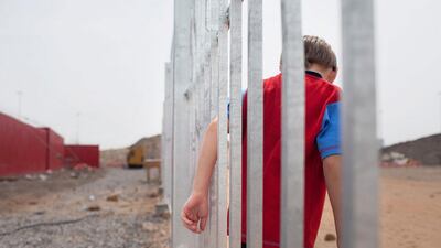 Antonin Valla slips between bars.
