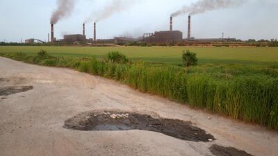 Steelworkers from Metinvest IIyich Iron and Steel Work, above, began regular foot patrols with local police in an effort to restore peace and re-establish order in Mariupol. John Moore / Getty Images