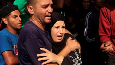 People react as Palestinian casualties, who were waiting to receive aid, are brought into Nasser hospital following an Israeli strike, according to the Gaza Health Ministry, in Khan Younis, southern Gaza Strip, June 17, 2025. REUTERS / Hatem Khaled