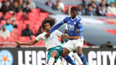 Kelechi Iheanacho of Leicester City is fouled by Nathan Ake of Manchester City.
