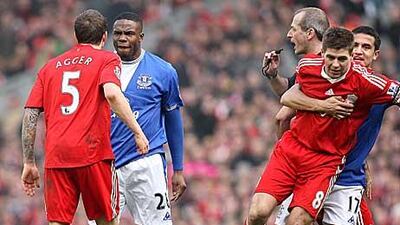 Victor Anichebe, the Everton striker, squares up to Liverpool’s Daniel Agger after a challenge as Steven Gerrard is pulled away by Tim Cahill during last season’s match at Anfield. These are familiar scenes when it comes to the Merseyside derby.