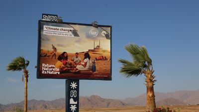 An advert for Cop27 on Peace Road.