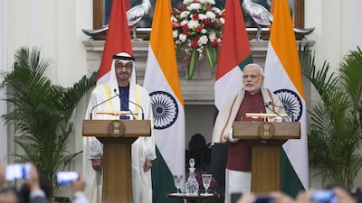 Sheikh Mohammed bin Zayed, Crown Prince of Abu Dhabi Deputy Supreme Commander of the UAE Armed Forces, left, with Indian prime minister Narendra Modi at the signing of several deals in New Delhi. Philip Cheung / Crown Prince Court - Abu Dhabi