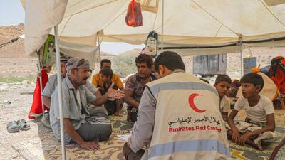 Staff from the Emirates Red Crescent's mobile clinic at work in Hadramawt governorate. The Emirati team performs check-ups on patients in rural areas that do not have health facilities. They provide treatment for many conditions.