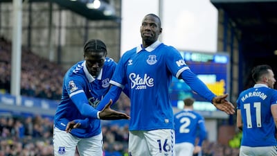 Everton's Abdoulaye Doucoure, right, celebrates after scoring their opener. PA