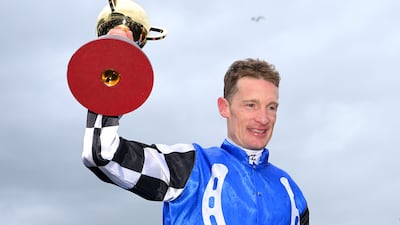 Mark Zahra celebrates with the trophy after winning race seven. Getty Images