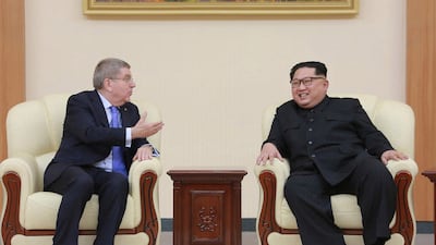 An undated photo released by the North Korean Central News Agency (KCNA), the state news agency of North Korea, shows Kim Jong-un meeting with Thomas Bach, president of the International Olympic Committee (IOC) during his visit to Pyongyang. EPA / via KCNA