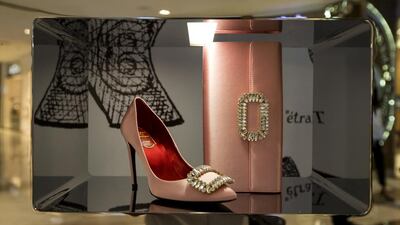 The Parisian label’s satin heels and elegant handbags are often the accessories of choice for evening events and galas. Christopher Pike / The National