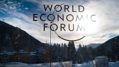 The sign of the World Economic Forum, WEF, is displayed at an entrance door at the congress center at the eve of the meeting in Davos, Sunday, Jan. 20, 2019. (AP Photo/Markus Schreiber)