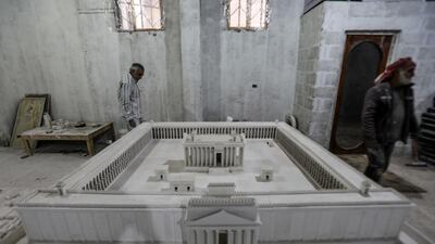 Ali Saleh surveys his model of ancient Palmyra, from his workshop in al-Bab, in northern Syria. Closely linked to the Silk Road, Palmyra changed hands a number of times, becoming part of the Roman empire in the first century. AFP