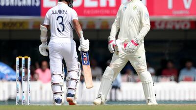 South Africa wicketkeeper Heinrich Klaasen, right, celebrates after taking the catch to dismiss India's Ajinkya Rahane. AP