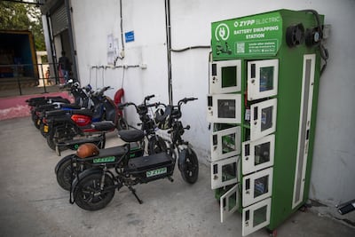 Electric scooters at a battery swapping station in Noida, Uttar Pradesh. India’s delivery companies are finding there aren’t many EV models available that can be deployed at scale. Photo: Bloomberg