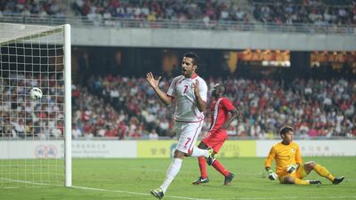 UAE’s Ali Mabkhout celebrates his and the team’s second goal on the way to a treble in a 4-1 victory in Hong Kong yesterday. Courtesy UAE FA