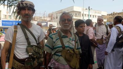 Houthi rebels hold a gathering to recruit fighters in the Red Sea port city of Hodeidah, on June 18, 2018. Abdo Hyder / AFP