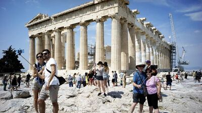 Selfies drive some people mad but they might soon be keeping us safe online. Milos Bicanski / Getty Images