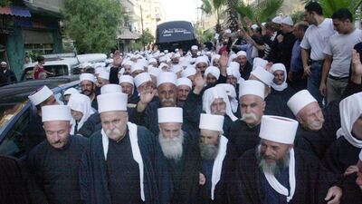 A 2004 file picture of members of the Syrian Druze community. (Bassem Tellawi / AP)