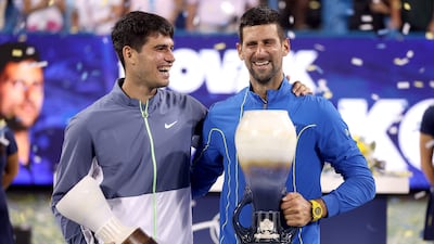Carlos Alcaraz and Novak Djokovic during the trophy ceremony after the Cincinnati Open final. Getty