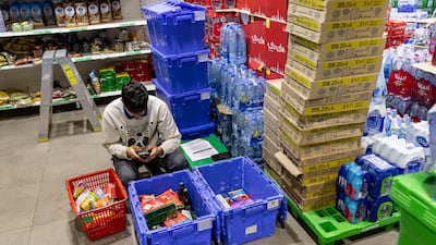 Items are placed in a basket before being collected and packed up for delivery
