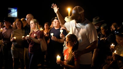 Mourners attend a candlelight vigil after a mass shooting at the First Baptist Church in Sutherland Springs, Texas, on November 5, 2017. Sergio Flores / Reuters