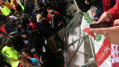 People are seen after a safety barrier collapsed at the Stade de la Licorne in Amiens, France on September 30, 2017, in this photo obtained from social media. Cedric Cazier / Reuters