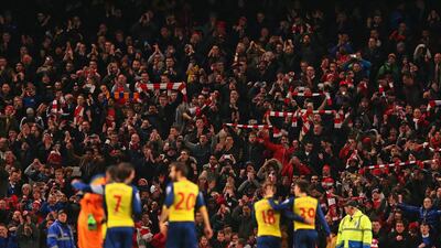 Arsenal fans and players are in celebratory mood after clinching victory at Etihad Stadium. Alex Livesey/Getty Images