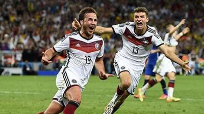 Germany's Mario Gotze, left, celebrates near teammate Thomas Mueller after scoring a goal during extra time in their 2014 World Cup final against Argentina at the Maracana. Reuters