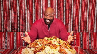 Shaquille O'Neal samples some of Abu Dhabi's culinary gems. Photo: DCT Abu Dhabi