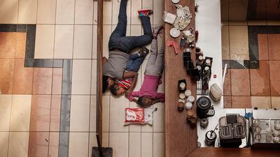 2nd prize, Spot News Stories: A woman and children hide after gunmen had opened fire in the Westgate mall in Nairobi. They escaped unharmed but 39 people were killed in one of the worst terrorist attacks in Kenya’s history. Tyler Hicks, The New York Times / AP Photo