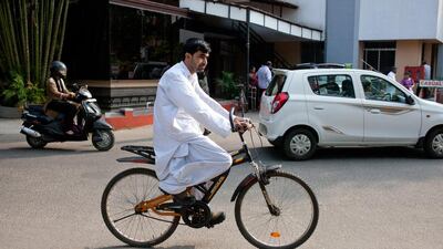 Almost a year on, Abdul Rahim’s body has not rejected his new hands. He is seen here riding bicycle as part of his rehabilitation programme. “All of this is remarkable,” he says. “I can eat by myself now, and I can drink water, and I can dress myself, and I can write,”