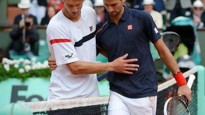 Novak Djokovic, right, committed 77 unforced errors en route to his fourth-round win over Andreas Seppi yesterday. Pascal Guyot / AFP