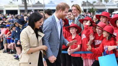 The royal couple visit primary school students at South Melbourne beach. EPA