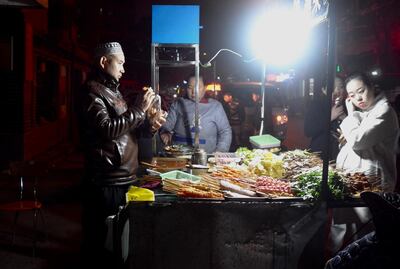 A halal kebab vendor with a customer. Courtesy James Langton