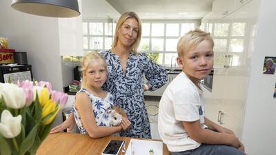 Mother-of-three, Clara Cloché, says she suffered from parental burnout last year. Here she is pictured with two of her three children, seven-year-old Lea, left, and Noah, 6. Photos by Antonie Robertson / The National