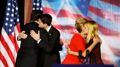 Republican presidential nominee Mitt Romney, left, and his vice presidential nominee Paul Ryan hug as their wives Ann Romney and Janna Ryan, right, do the same after Romney delivered his concession speech. Mike Segar / Reuters