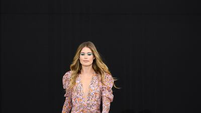 Doutzen Kroes walks the runway during the L'Oreal Paris show as part of Paris Fashion Week on September 28, 2019. Getty Images