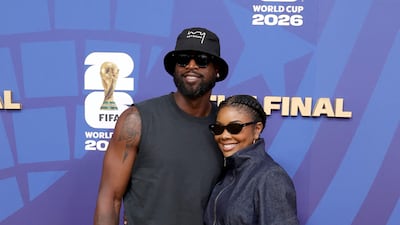 Dwyane Wade and Gabrielle Union attend the game in East Rutherford, New Jersey. Getty