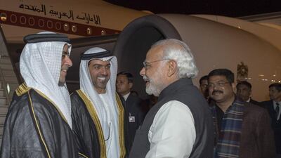 Lt Gen Sheikh Saif bin Zayed, Deputy Prime Minister and Minister of Interior, and Sheikh Hamed bin Zayed, Chairman of Crown Prince Court - Abu Dhabi and Managing Director of the Abu Dhabi Investment Authority, are greeted by Narendra Modi, Prime Minister of India, upon arriving at Air Force Station, commencing an official visit to India. Ali Essa